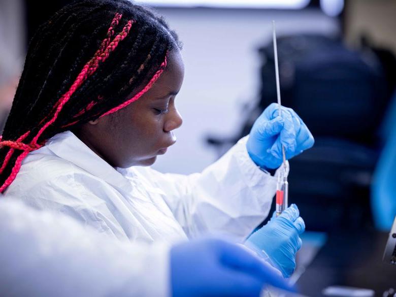 student in biology lab